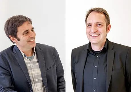 Robert Birker, synaigy Geschäftsführer, und Dr. Raphael Richter von der e-Spirit AG im Gespräch über die Vorteile des FirstSpirit CMS.
